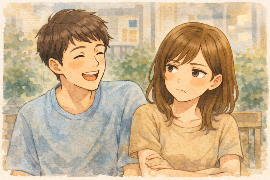 楽しそうな彼氏とうんざり気味の彼女。恋が冷めた感じを表現。